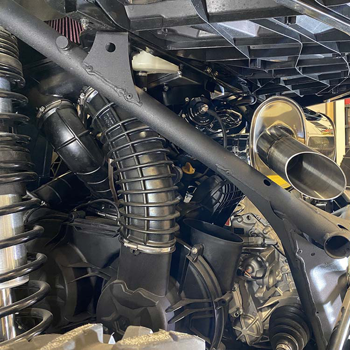 Treal Performance | 2017-2025 Can-Am Maverick X3 Trail Side Exit Exhaust System-Exhaust-Treal Performance B2B-Non-Resonated Front Section-Black Market UTV